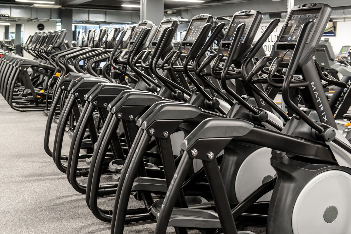 PureGym London Wembley: Rows of stationary cycles arranged neatly in a gym studio.