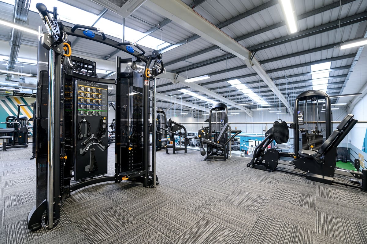 PureGym South Ruislip: Resistance machines, cable pulleys, weight racks, and rubberized flooring in a gymnasium.