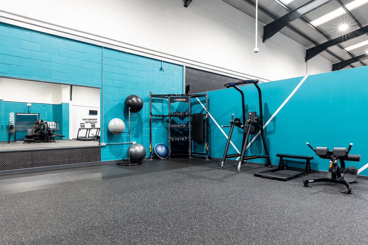 PureGym Leeds Hunslet: Functional training area with rig, medicine balls, plyo boxes, and rubberized flooring.