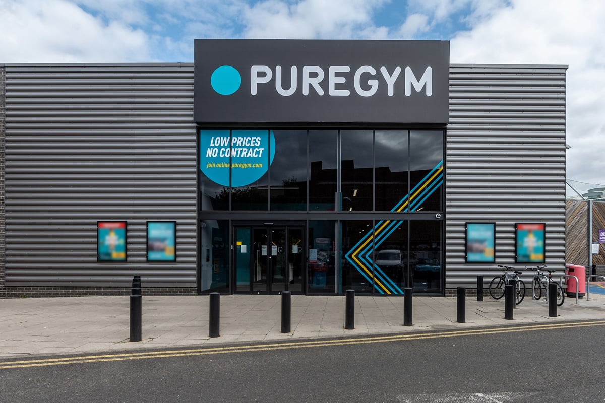 PureGym Spalding: Exterior of a PureGym fitness facility with signage and parking spaces visible.