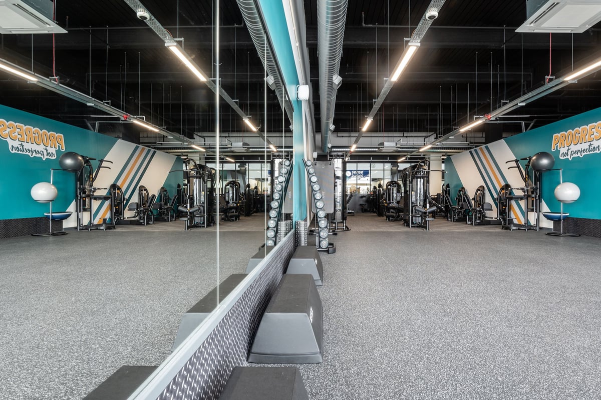 PureGym Edinburgh Ocean Terminal: Resistance machines, free weights, benches, and rubberised flooring in gym studio.