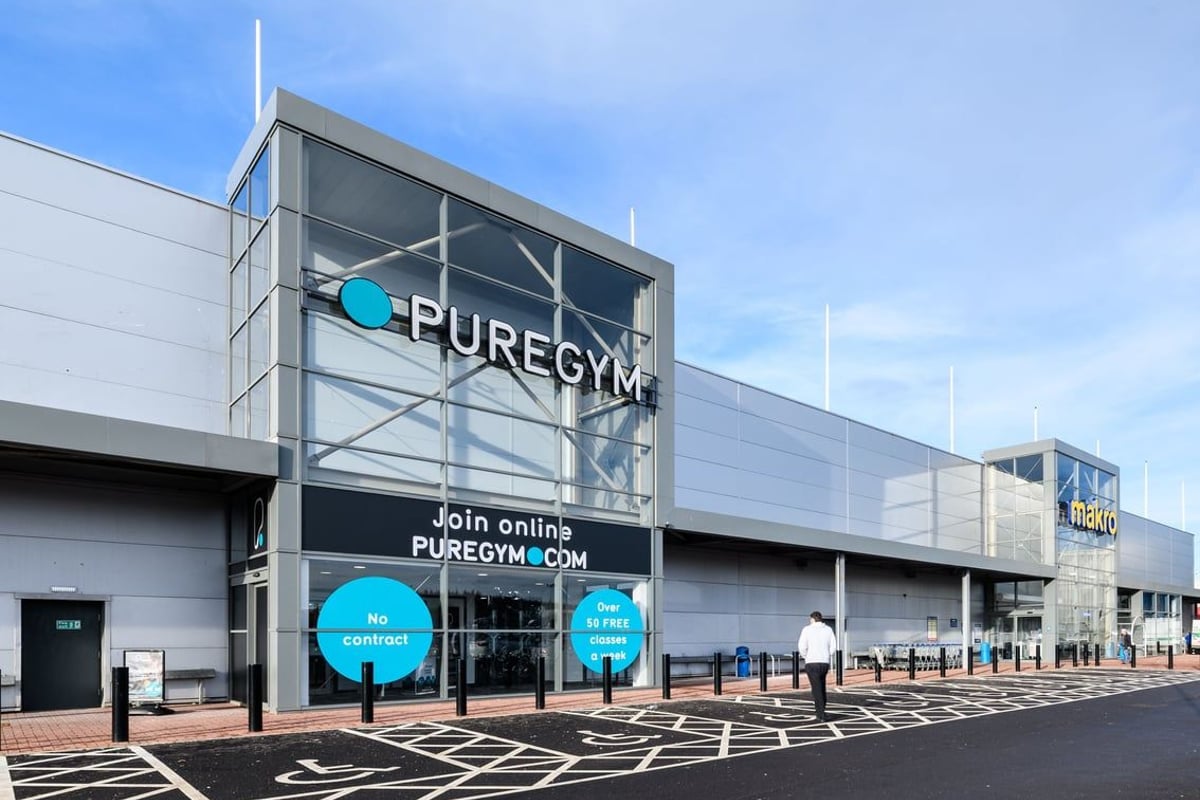 PureGym Aberdeen Wellington Circle: Pure Gym exterior with signage, parking spaces, and entrance visible.