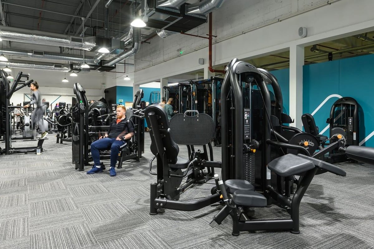 PureGym Northampton Weston Favell: Weight machines, plate-loaded equipment, and rubberized flooring in a modern gym space.