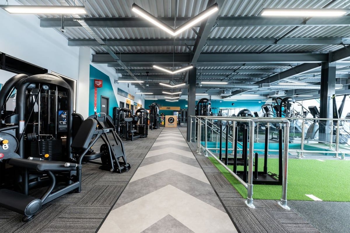 PureGym Yate: Treadmills, weight machines, functional training area with turf, free weights, and exercise balls.