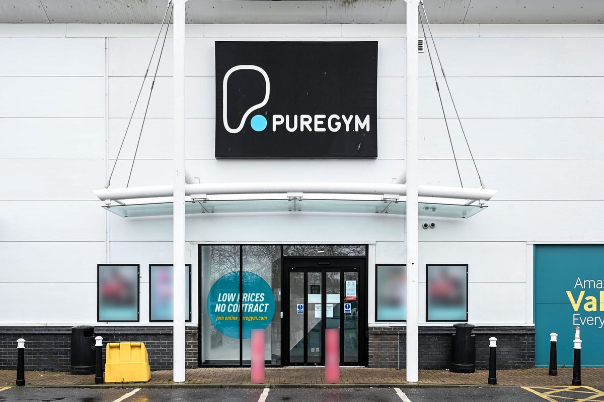 PureGym Canterbury Sturry Road: The gym exterior with signage, glass doors, and a few parking spaces visible.
