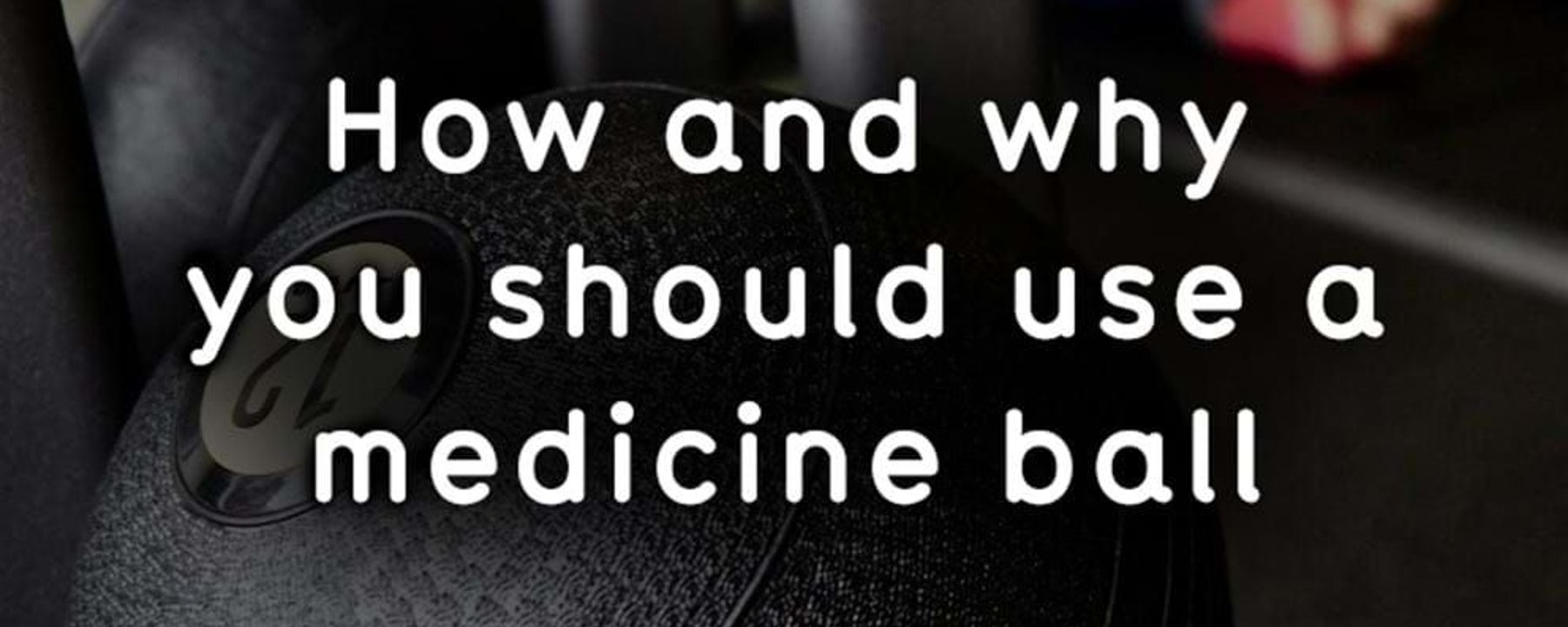 Close-up of a black 6 kg medicine ball with text overlay about its use.
