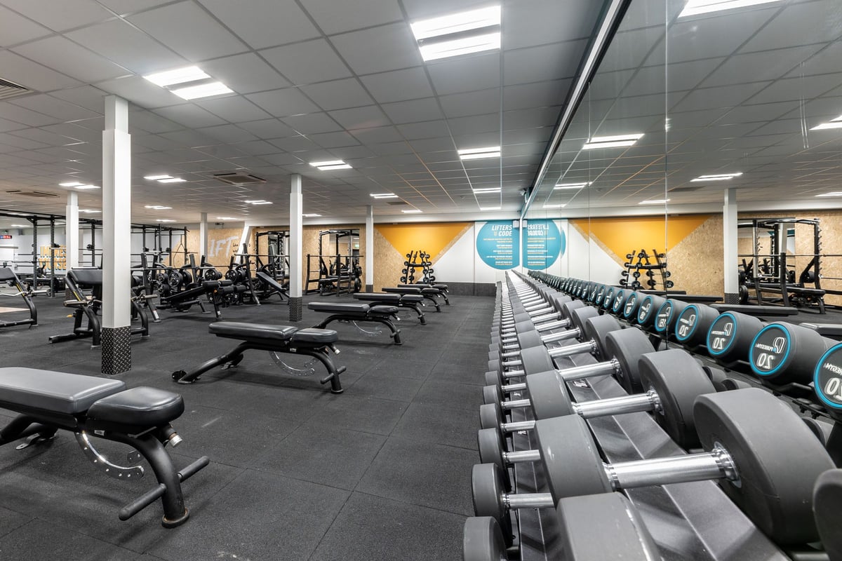 PureGym Gloucester Retail Park: Weight benches, dumbbell racks and resistance strength training machines.