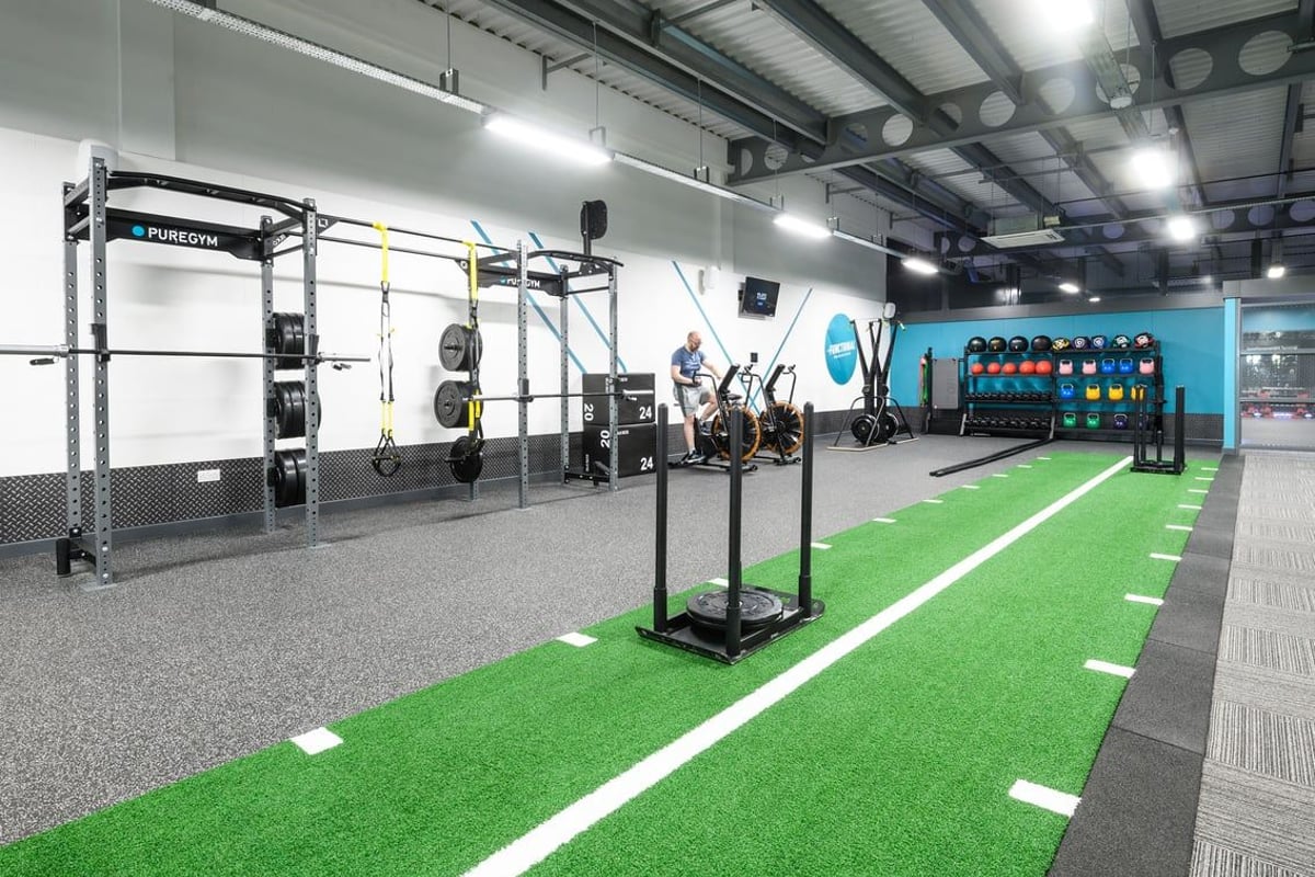PureGym Leeds Thorpe Park: Rig frames, kettlebells, medicine balls, green turf area for functional training.