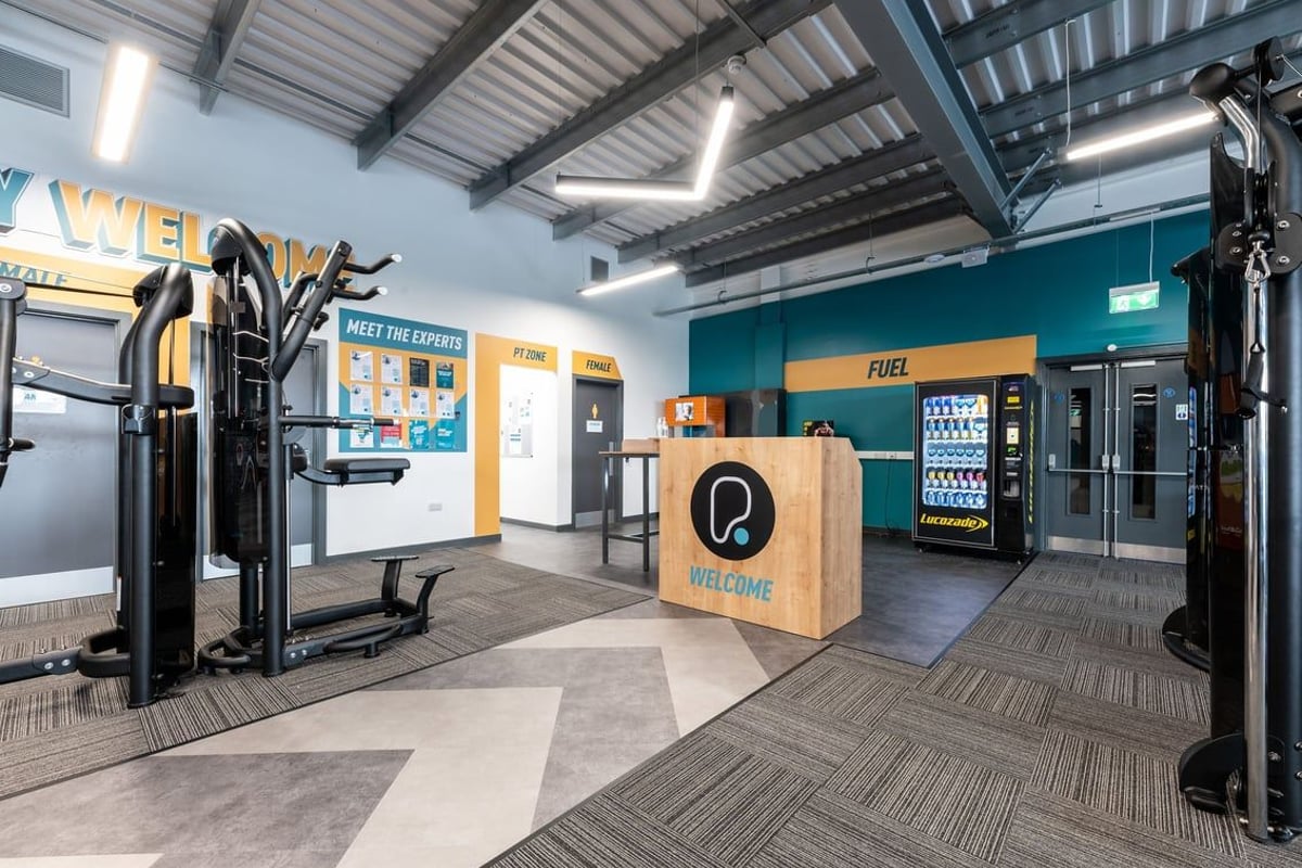 PureGym Yate: Vending machines, welcome desk, fitness equipment rental or check-in area.