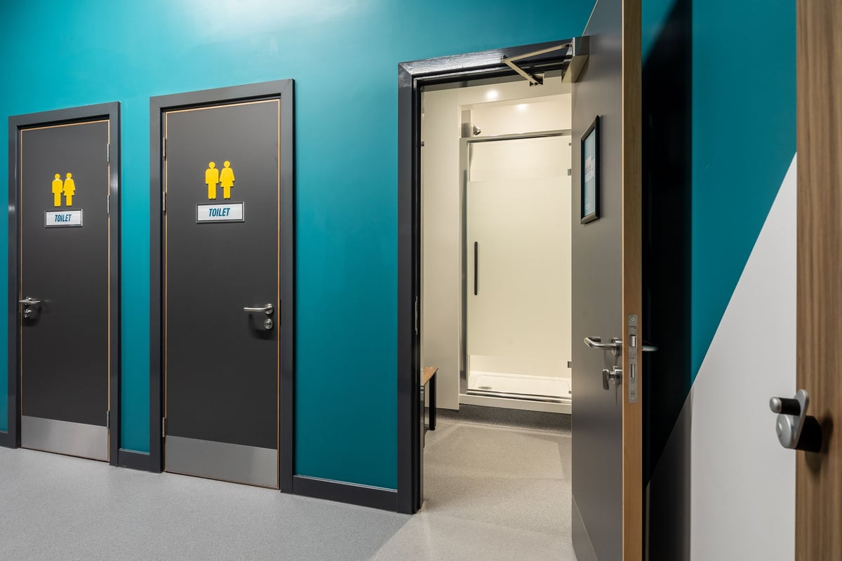 PureGym Wantage: Restrooms labelled as male and female, with a private changing room visible.