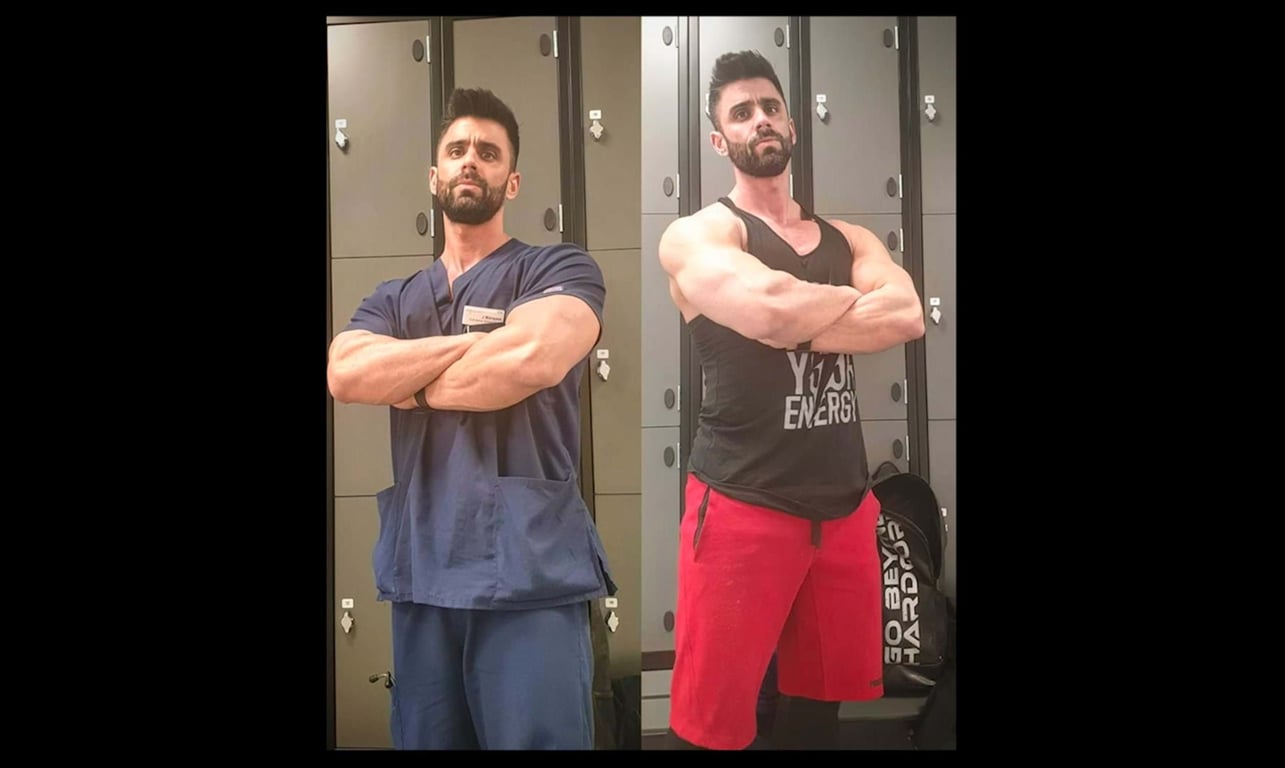 Two muscular men with crossed arms standing in front of lockers in gym changing room