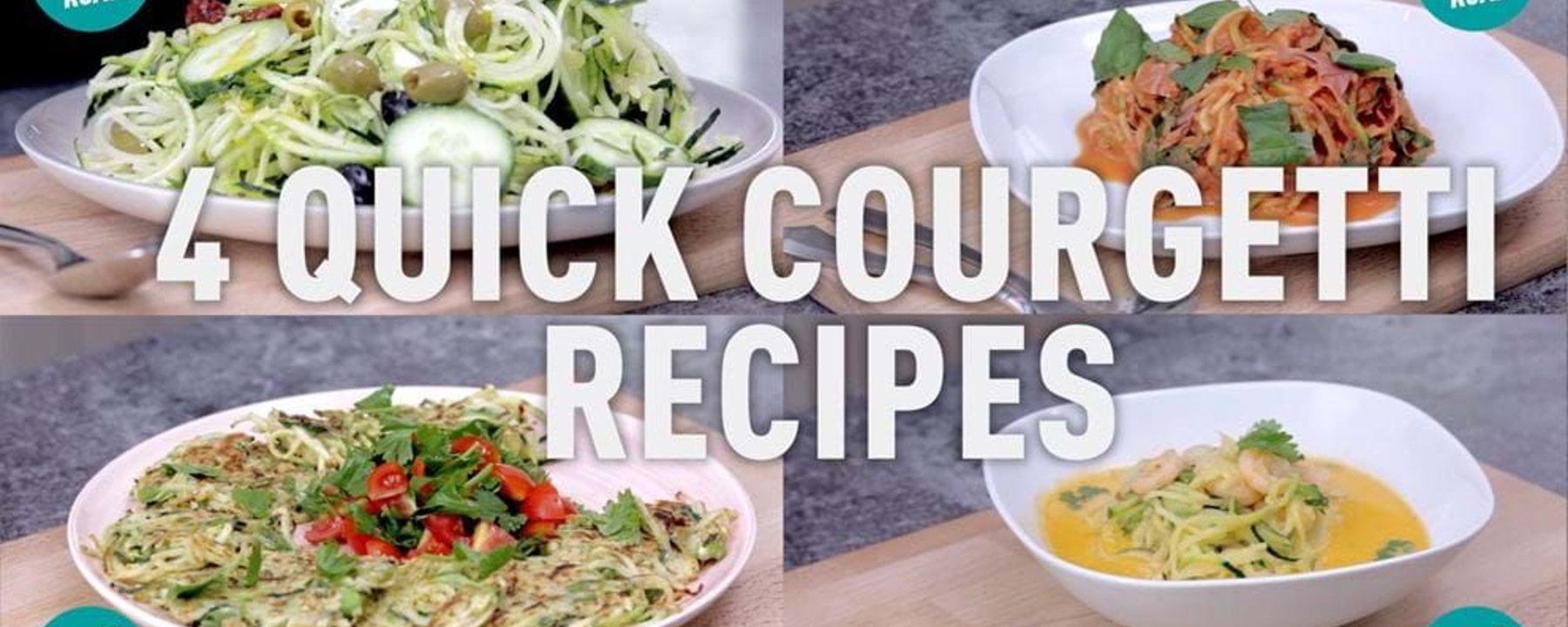 Four white plates of spiralised courgette dishes on grey kitchen worktop