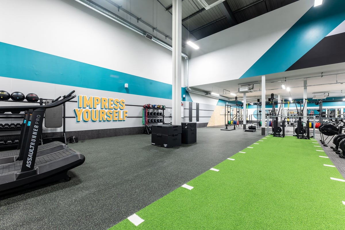 PureGym Watford Waterfields Retail Park: Treadmills, resistance machines, free weights, turf area, and mirrored walls.