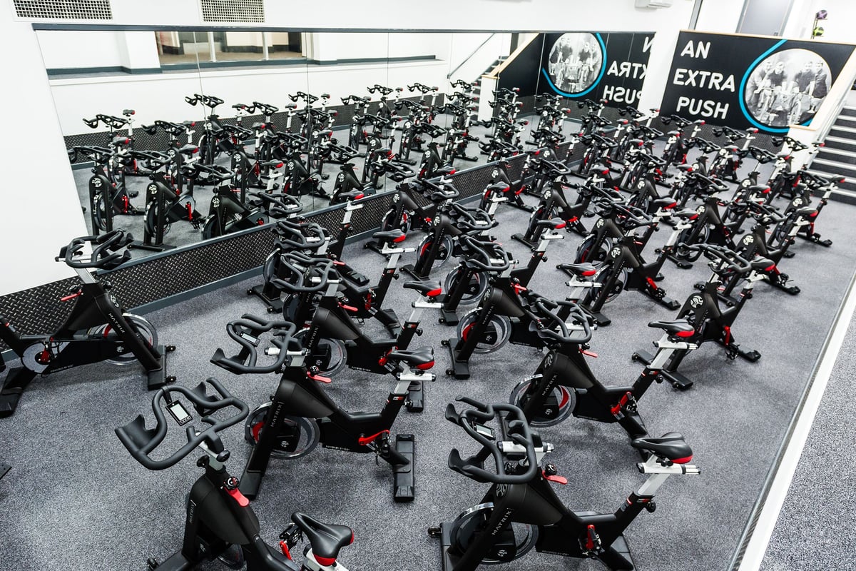 PureGym London Holborn: Rows of stationary exercise bikes crammed together in an indoor space.