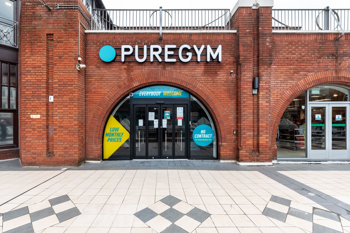 PureGym London Ealing Broadway: Brick facade with PureGym signage leading to gym entrance.