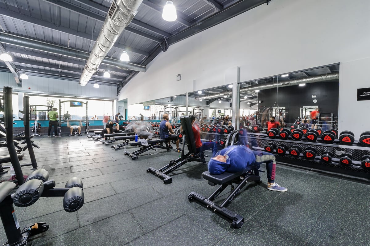 PureGym Leicester Walnut Street: Dumbbell racks, weight plates, resistance machines and benches.