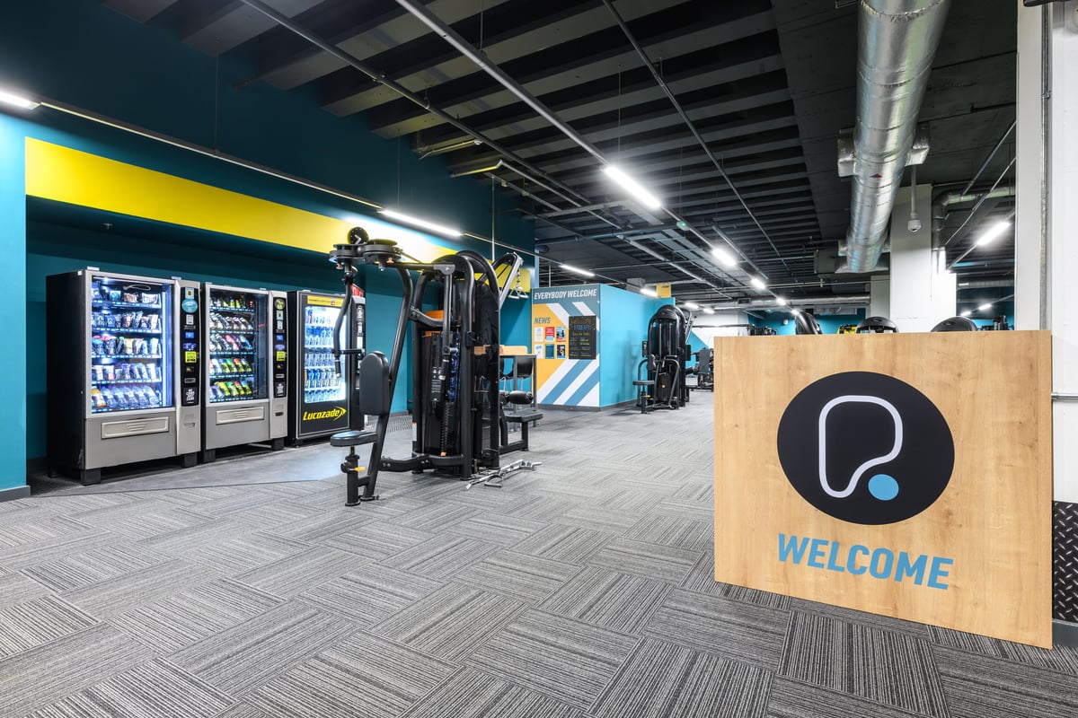 PureGym Salford hub area with vending machines