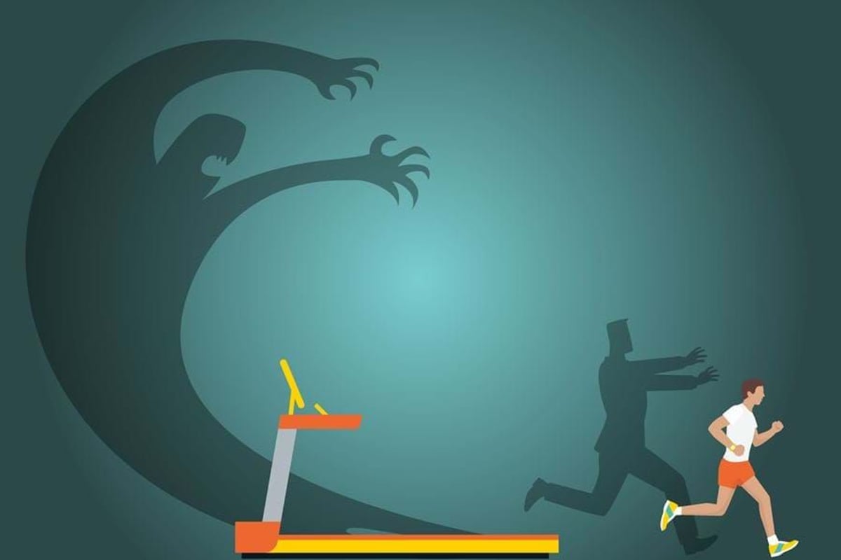 Man running away from shadow monster and shadow figure behind treadmill