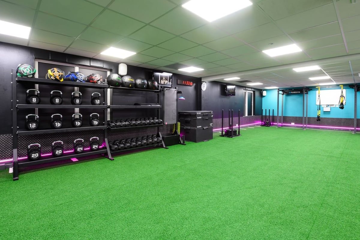 PureGym Burnham: Free weight racks, medicine balls, resistance bands, turf flooring with lifting platforms.