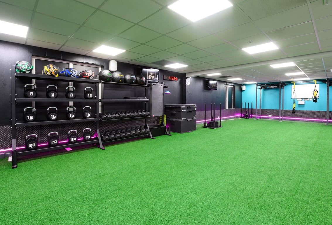 PureGym Burnham: Free weight racks, medicine balls, resistance bands, turf flooring with lifting platforms.