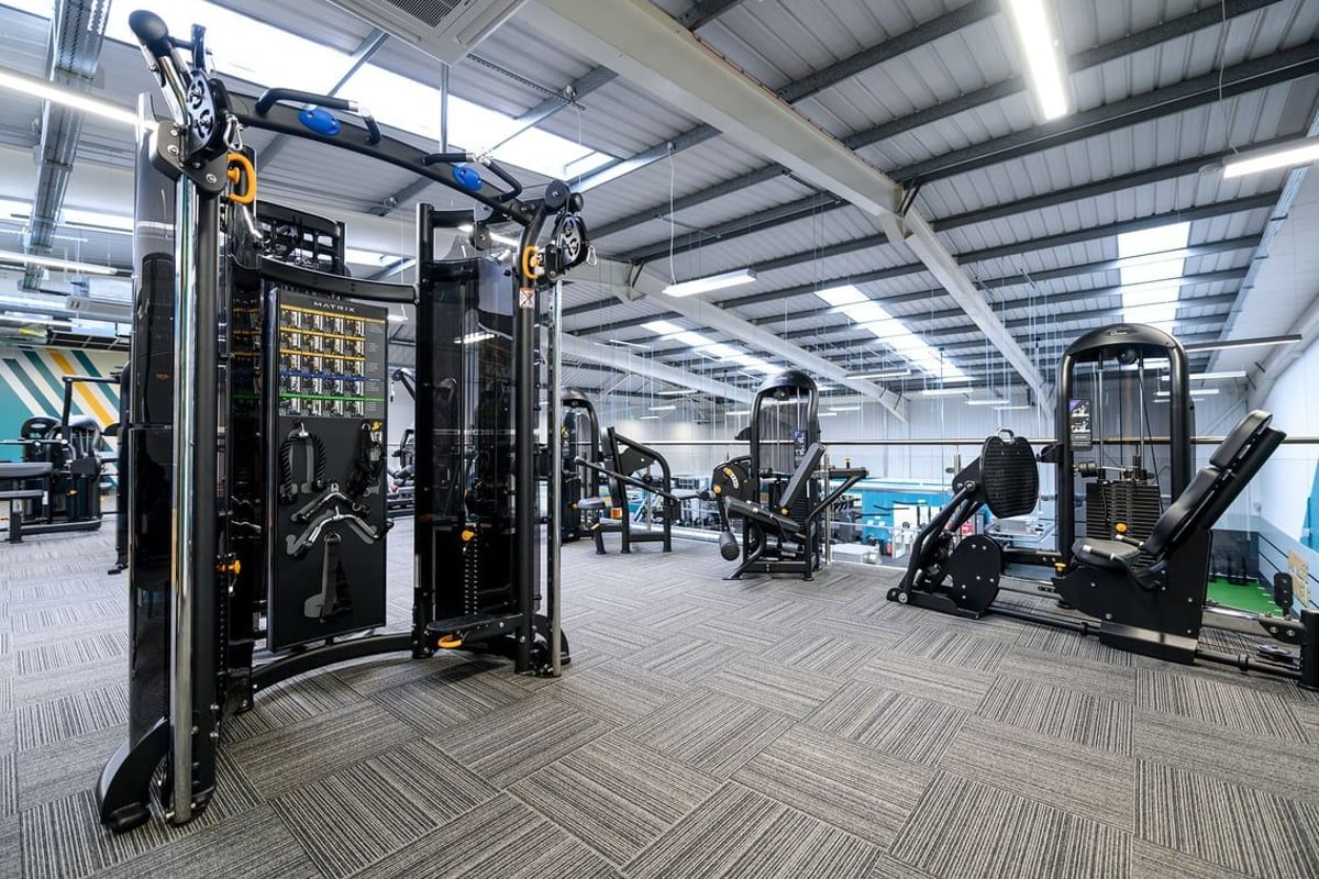 PureGym South Ruislip: Resistance machines, cable pulleys, weight racks, and rubberized flooring in a gymnasium.