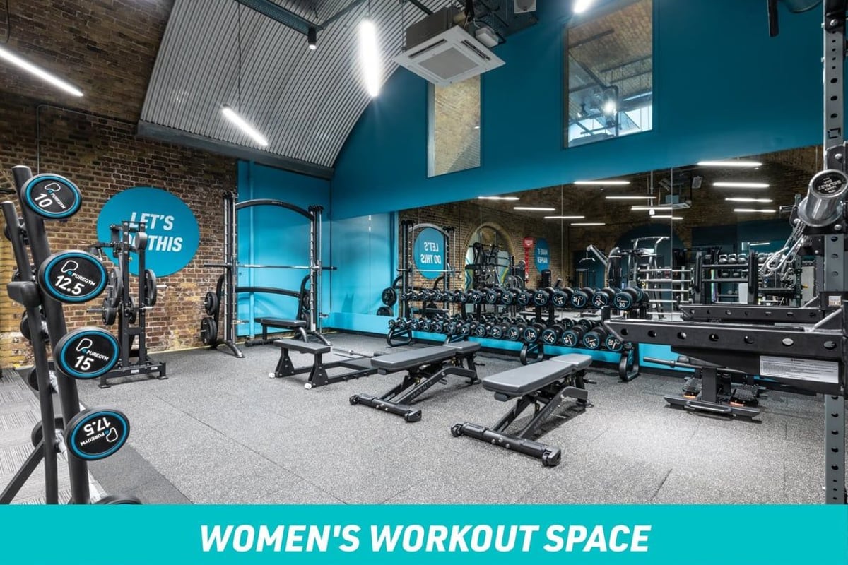 PureGym London Waterloo Women's Workout Space: Free weights area with benches and dumbbells