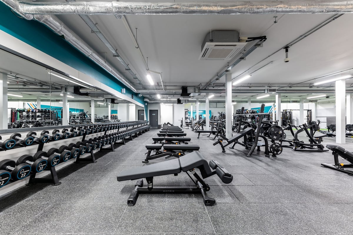 PureGym Broadstairs Westwood Gateway Retail Park: Gym studio with rows of cardio machines, weight benches, and free weights.