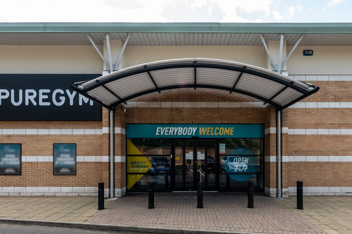 PureGym Ballymena: Gym entrance with 'EVERYBODY WELCOME' signage and modern awning.