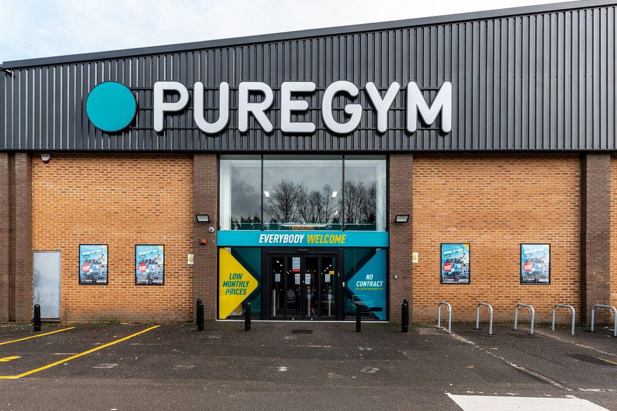 PureGym Sevenoaks: The gym exterior with large windows, entrance turnstiles, and branded signage "Pure Gym".