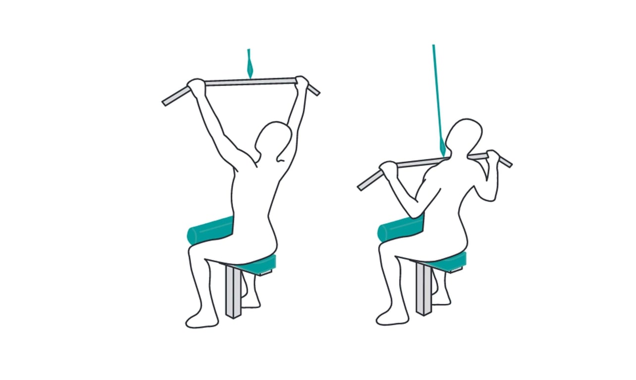 Person performing lat pulldown exercise on a machine with a wide grip bar.