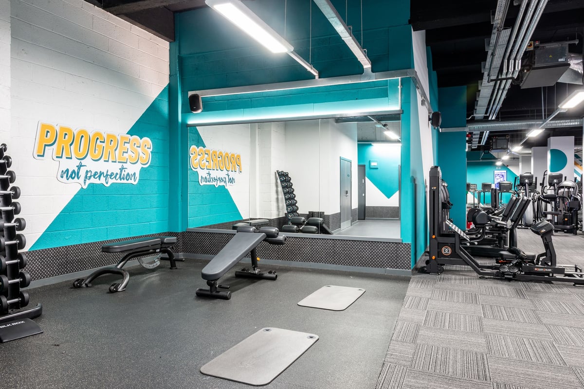 PureGym Manchester Market Street: Bench presses, weight plates, resistance machines and rubberised flooring.