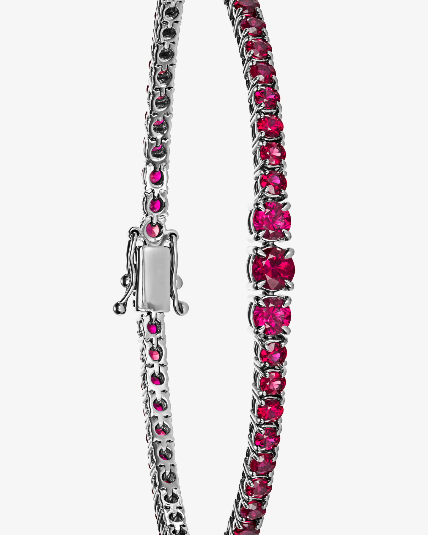 Bransoletka tenisowa z białego złota 750 z rubinami