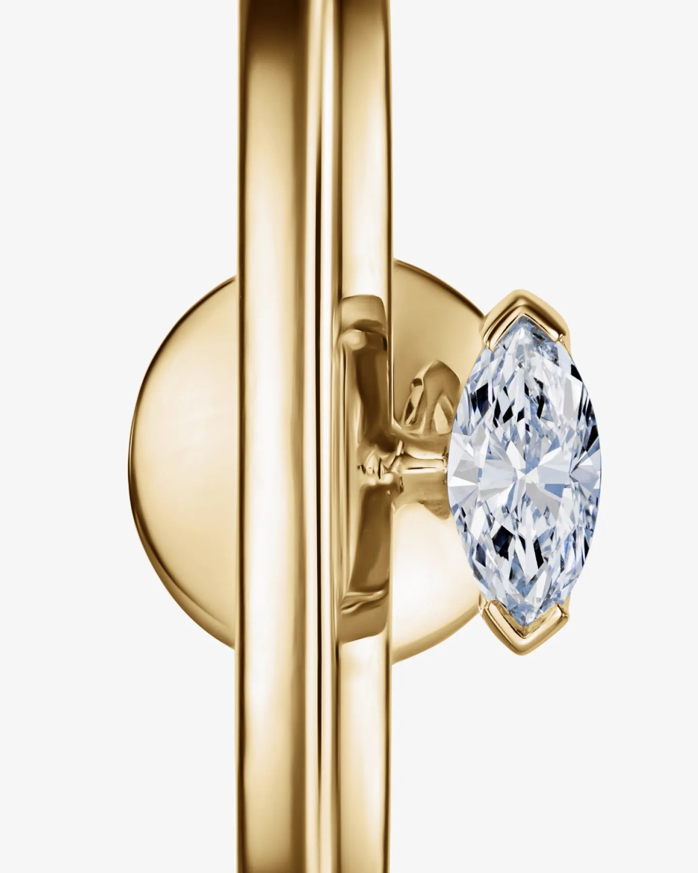 Pojedynczy kolczyk z diamentem w szlifie markiza 0.15 ct w żółtym złocie 585