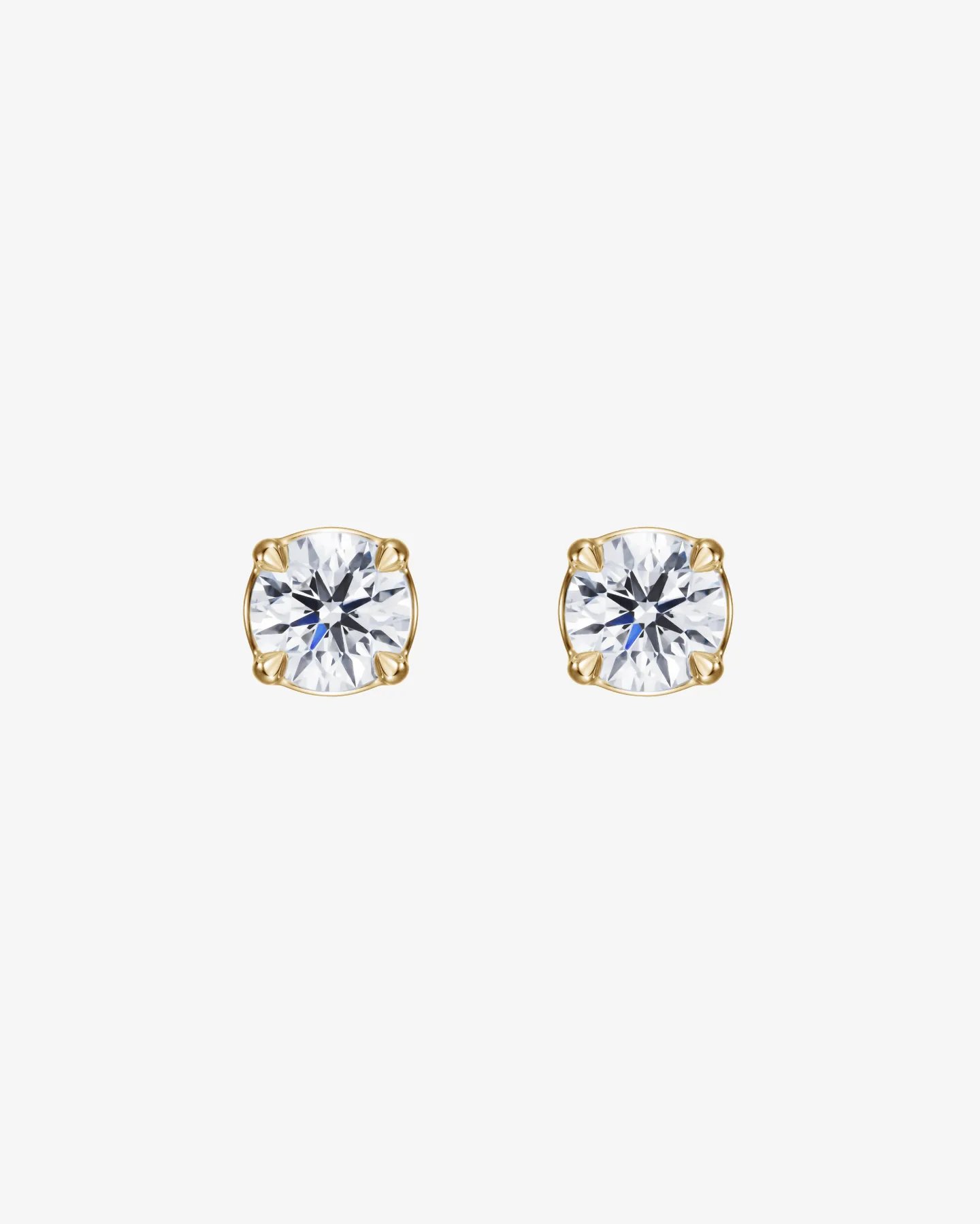 Kolczyki Solitaire na sztyft z brylantami 0.70 ct w żółtym złocie 750