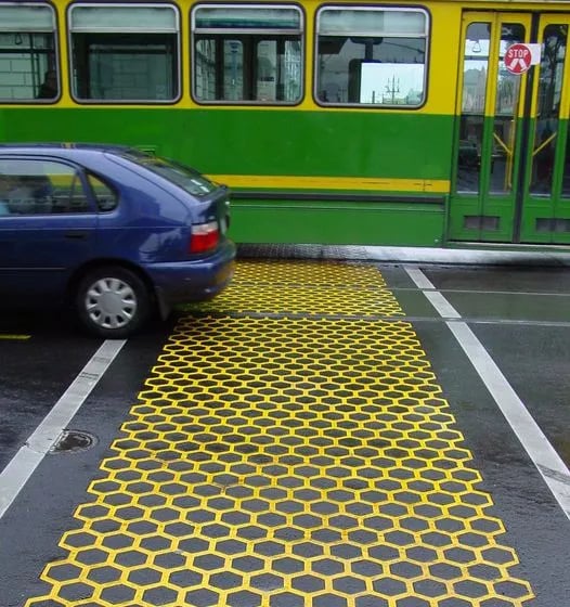 Duratherm Pedestrian Crossing in Melbourne with Tram