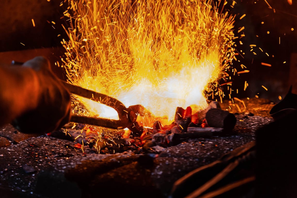 Red hot metal in a forge