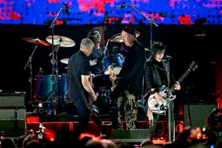 Joan Jett (front, right) performs with Nirvana at the FireAid concert at the Kia Forum in Inglewood, California on January 30, 2025