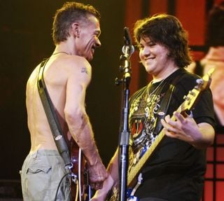 Eddie (left) and Wolfgang Van Halen perform onstage at Bobcats Arena in Charlotte, North Carolina on September 27, 2007