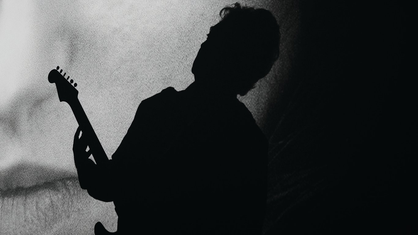 Silhouette of a guitar player