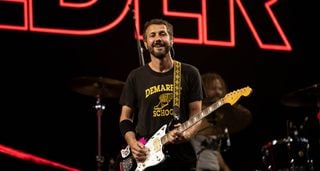 Grant Nicholas of Feeder onstage with a Jazzmaster in 2022.