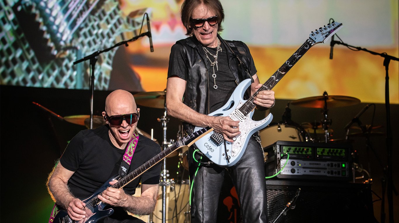 Joe Satriani (left) and Steve Vai perform onstage