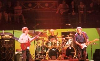 (from left) Jack Bruce, Ginger Baker, and Eric Clapton perform onstage at the Royal Albert Hall in London on May 5, 2005