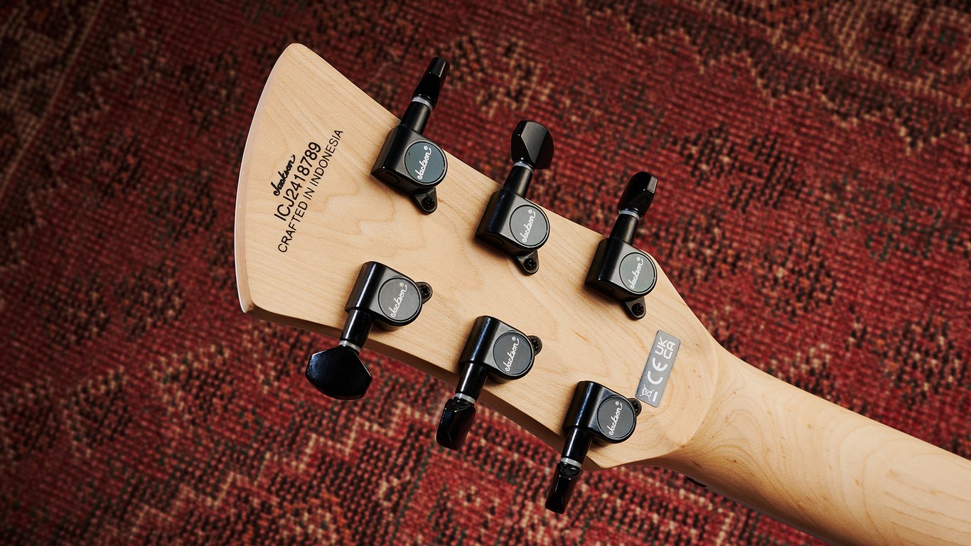The rear of the headstock of the Jackson X Series Surfcaster