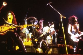 Kiss perform onstage at the Civic Auditorium in Long Beach, California on May 31, 1974