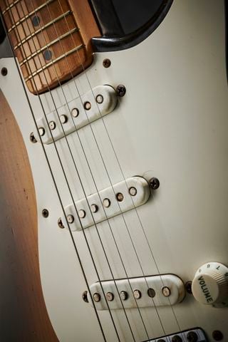 Detail of the pickups on a vintage 1954 Fender Stratocaster, previously owned by The Who bassist John Entwistle