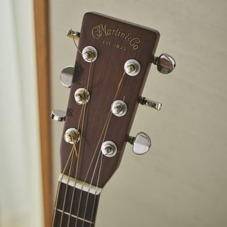 You can see the characteristic cigarette burns on the guitar headstock