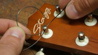Feed through the tuner hole&hellip; again