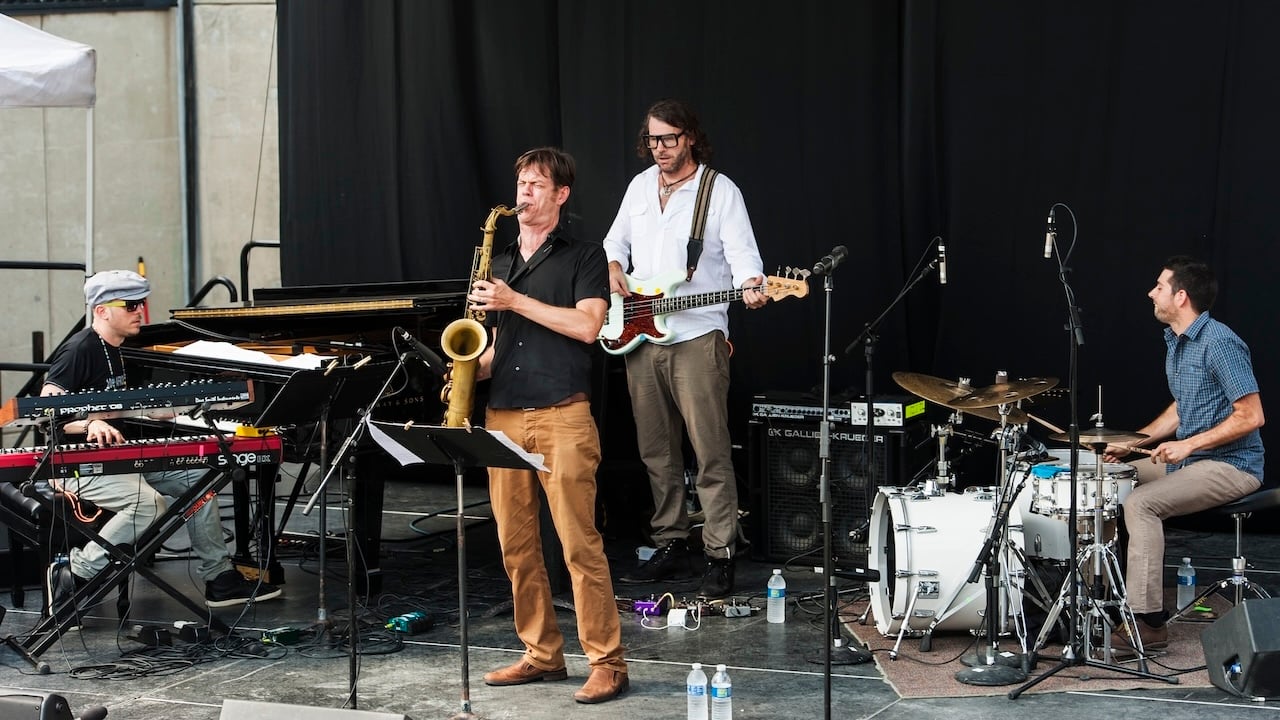 Donny McCaslin Group performs on the Absopure Pyramid Stage at the Detroit Jazz Festival, Detroit, Michigan, September 3, 2012. Pictured are, from left, Jason Lindner, on piano and electric piano, bandleader Donny McCaslin, on tenor saxophone, Tim LeFebvre, on electric bass guitar, and Mark Giuliana, on drums.
