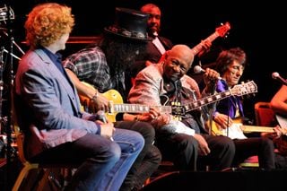 (from left) Mick Hucknall, Slash, and Ronnie Wood perform with B.B. King at the Royal Albert Hall in London on June 28, 2011