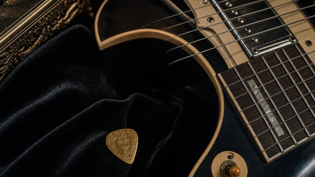 Pink Floyd’s 18-Carat Gold Guitar Pick Is Real, Playable, and Very Expensive hero image